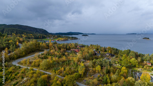 Aerial View of Coastal Village with Autumn Foliage in Norwegian fjords