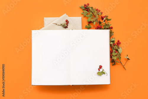 Books and rose hip branch o...