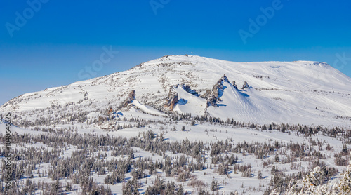 Sheregesh Kemerovo region ski resort in winter, landscape on mountain aerial top view photo