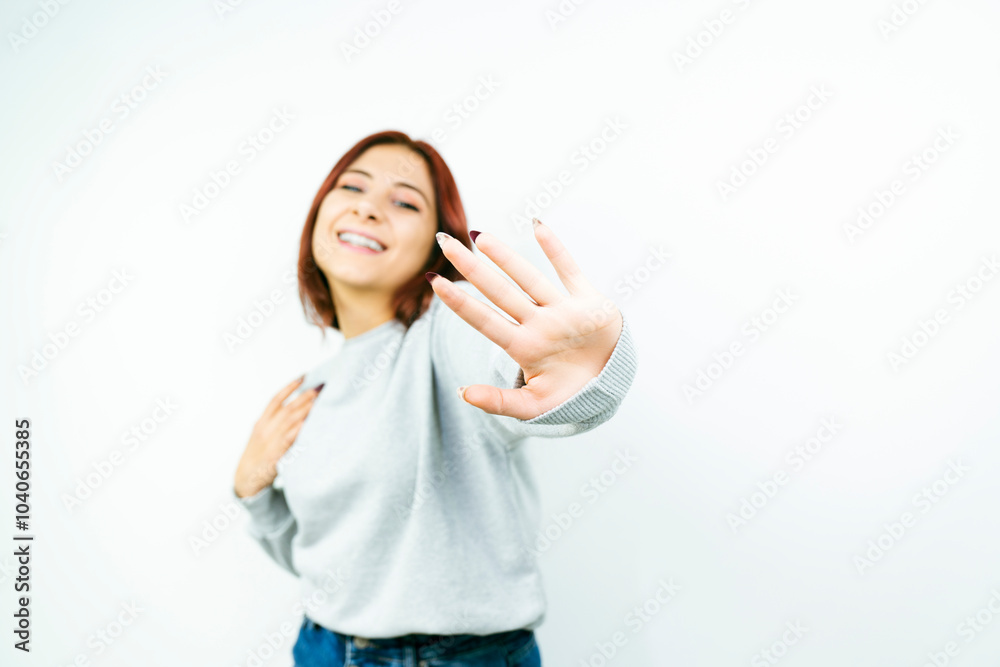 Happy portrait of redhead young woman in studio Happy portrait of redhead young woman in studio