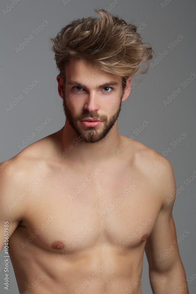 Handsome man with topless body. Muscular torso. Strong brutal guy. Portrait of handsome sexy man. Muscular model. Handsome young man with naked body, bare torso, undressed. Sexy man.