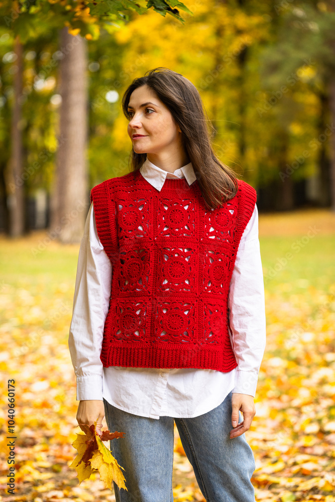close-up portrait of a girl in a city park in autumn, brunette in bright clothes against the background of yellow maple leaves, beautiful autumn cityscape close-up portrait of a girl in a city park in autumn, brunette in bright clothes against the background of yellow maple leaves, beautiful autumn cityscape