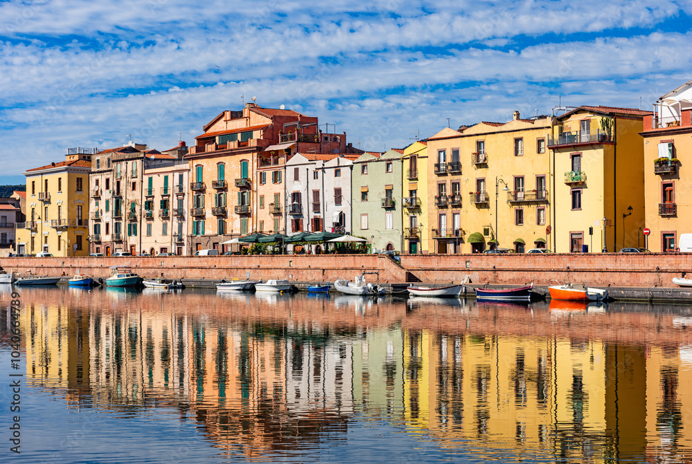 Beautiful view of the picturesque town of Bosa with its colorful houses reflected in the Temo River, Sardinia, Italy. Beautiful view of the picturesque town of Bosa with its colorful houses reflected in the Temo River, Sardinia, Italy.