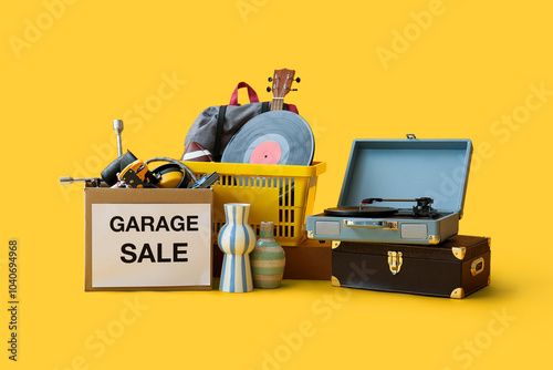 Unwanted stuff for garage sale on yellow background