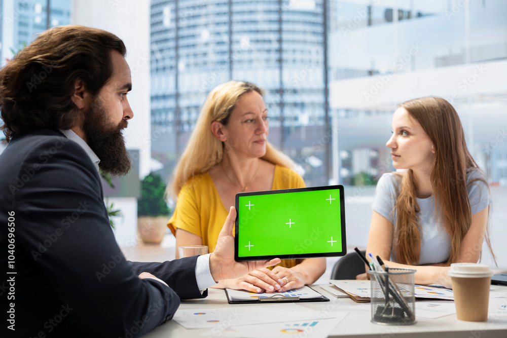 People receiving personalized financial plan from financial advisor using isolated screen tablet. Customers learn how to make profitable decisions from agent using chroma key device People receiving personalized financial plan from financial advisor using isolated screen tablet. Customers learn how to make profitable decisions from agent using chroma key device