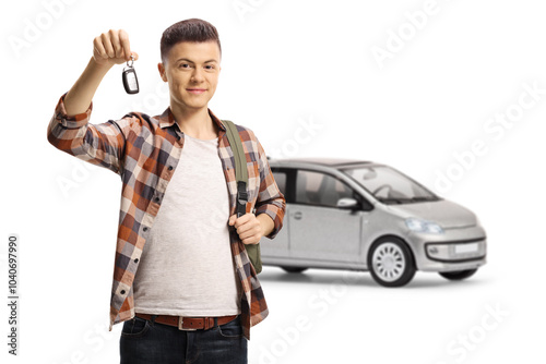 Male student with a car showing a key