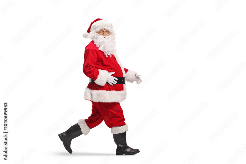 Santa Claus walking and looking at camera Santa Claus walking and looking at camera