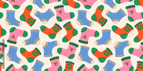 Seamless pattern with Christmas socks with xmas ornaments. Noel socks with snowflakes, deer, bows. Red, blue, pink, green. Stockings for holiday projects, gift wrap, textiles, and seasonal designs.