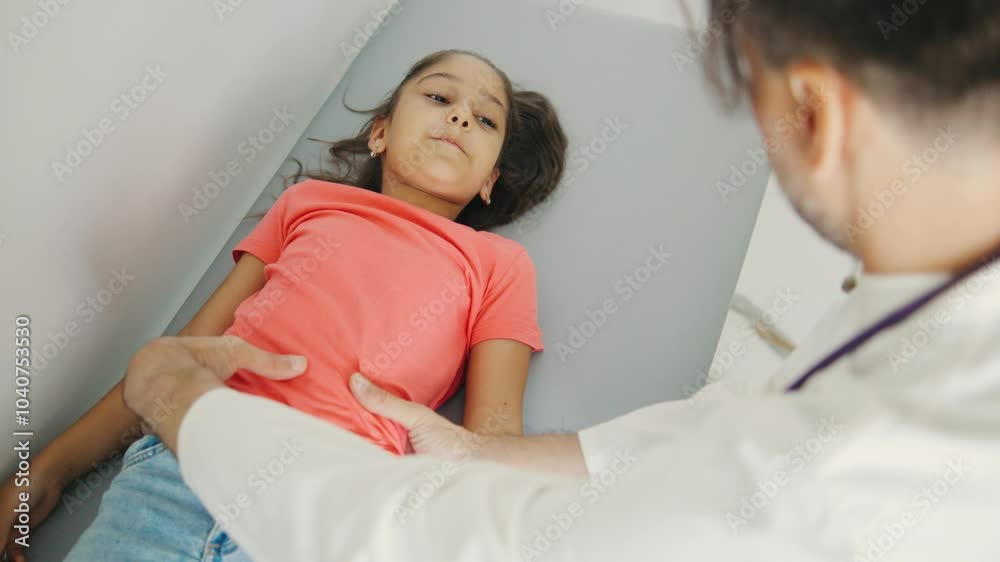 A comprehensive Medical Examination of a Child on the couch is performed by a skilled Pediatric Doctor to guarantee optimal health and proper development A comprehensive Medical Examination of a Child on the couch is performed by a skilled Pediatric Doctor to guarantee optimal health and proper development