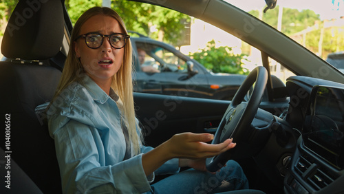 Schilderij op canvas Caucasian woman driving car honk traffic jam rules screaming yelling conflict gi