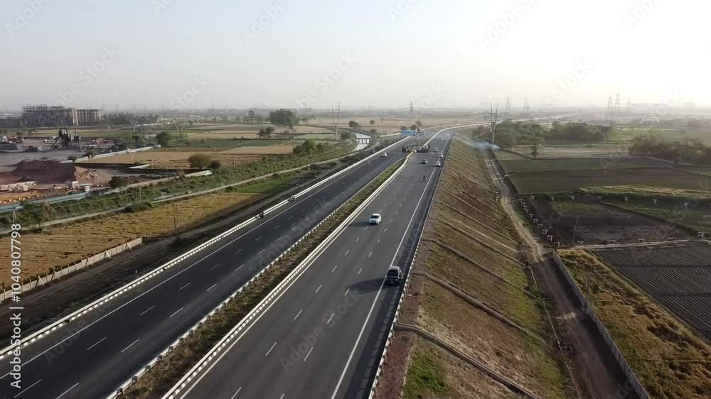 Spectacular Aerial view of Highway in India showing progress of road infrastructure and development Spectacular Aerial view of Highway in India showing progress of road infrastructure and development