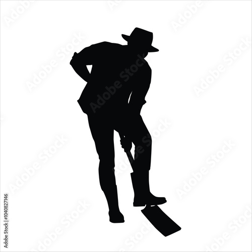 Silhouette of a farmer digging a hole using a shovel