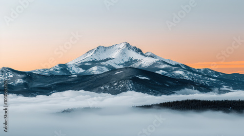 Majestic snow covered mountain peaks rise above sea of clouds at sunrise, creating breathtaking landscape. serene atmosphere evokes sense of tranquility and wonder