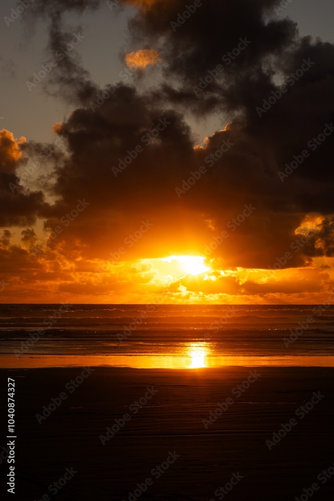 Sunset at Piha beach, New Zealand Sunset at Piha beach, New Zealand