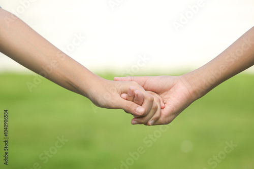 Close up of diverse couple holding hands,free time and vacation. #1040906584