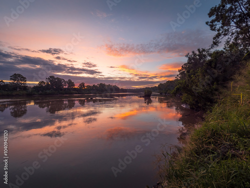 Sunset by the River with Reflections
