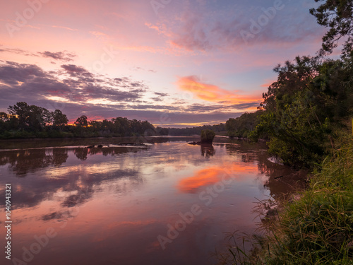 Sunset by the River with Reflections