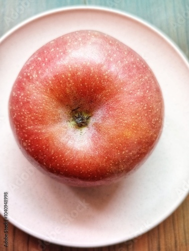 Portrait of an apple on the table