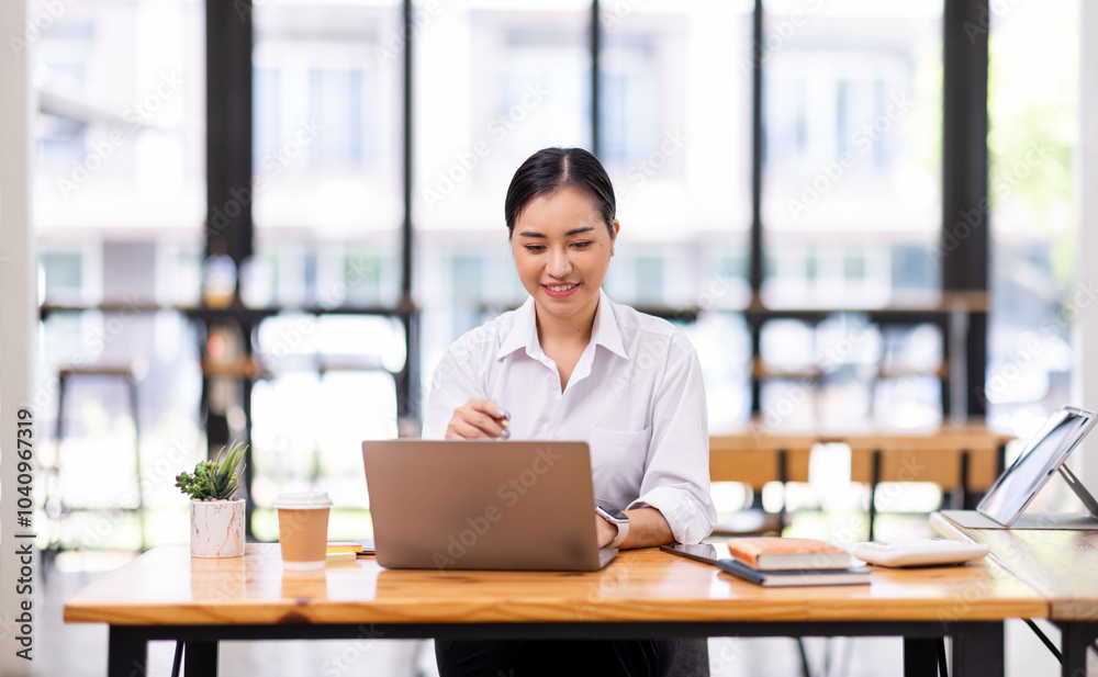 Asian Business woman work at workplace. concept of tax, report, accounting, statistics, and analytical research.
Asian Business woman work at workplace. concept of tax, report, accounting, statistics, and analytical research.