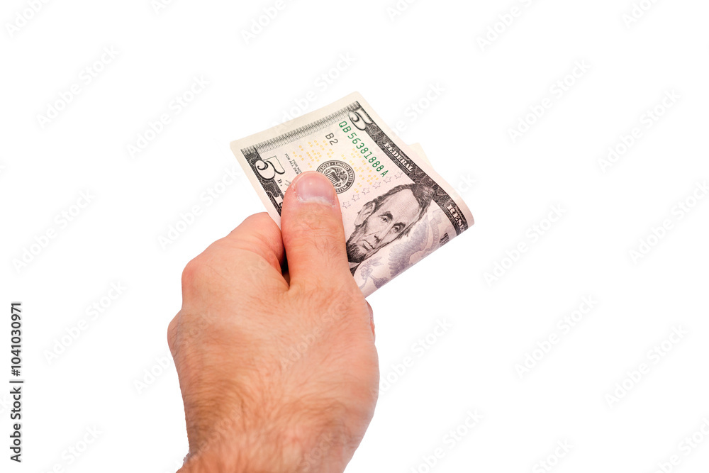 Hand holding a five dollar bill Hand holding a five dollar bill