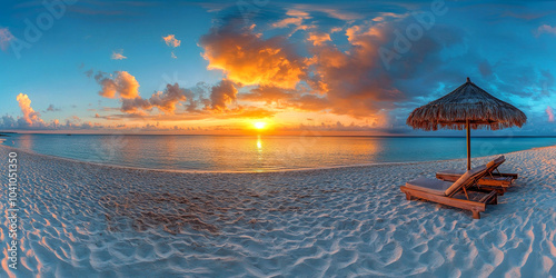 Tranquil beach sunset with empty loungers and dramatic sky