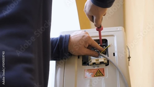 AC Electrician Technician Repairing Air Conditioner Appliance