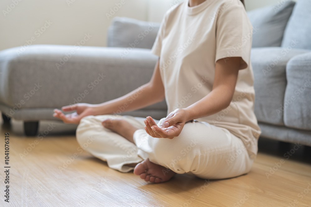 Meditation concept, closed eye asian young woman, girl hand in calm pose sitting practice meditating in lotus position on couch at home, relax, exercise for wellbeing. Relaxation, happy leisure people Meditation concept, closed eye asian young woman, girl hand in calm pose sitting practice meditating in lotus position on couch at home, relax, exercise for wellbeing. Relaxation, happy leisure people