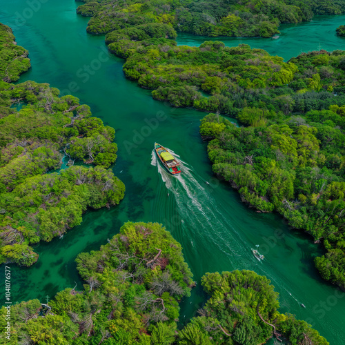 Saudi Arabia- Jazan Province- Aerial view of boat sailing through mangrove forest in Farasan Islands archipelago
 photo