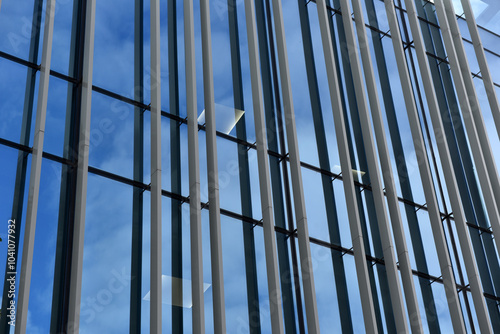 Wallpaper Mural Skyscraper glass window facade, clouds and blue sky reflecting on windows Torontodigital.ca