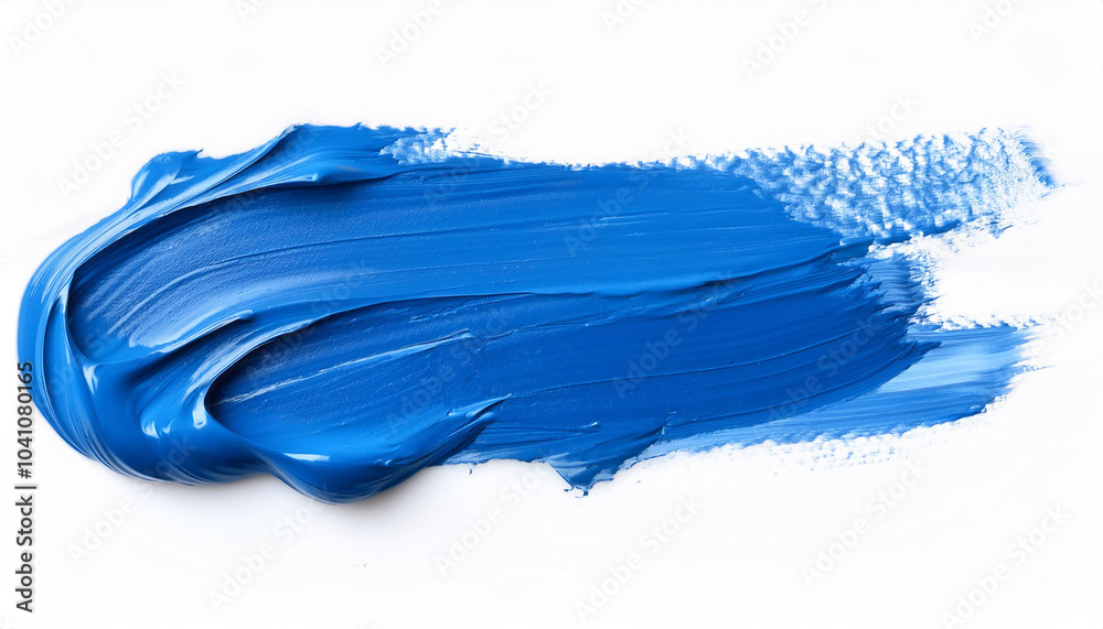 Vibrant blue brush stroke of acrylic paint isolated on a pure white background