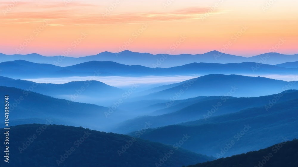 Fototapeta premium Serene Panoramic View of Misty Mountains at Dawn