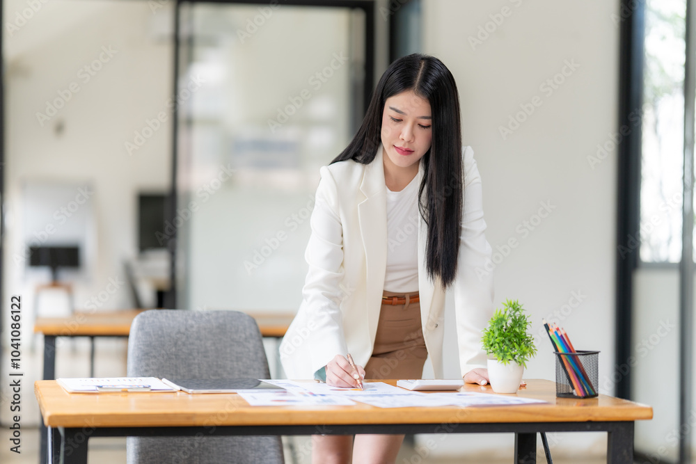 Focused Businesswoman at Desk Focused Businesswoman at Desk