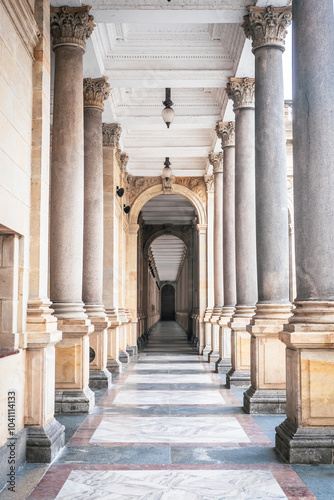 Beautiful and scenic postcard view of a corridor at the Mill Colonnade  Ml  nsk   Kolon  da  in Karlovy Vary  Czech Republic