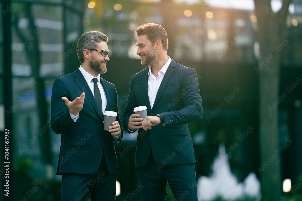 Colleague have business meeting. Business of businesspeople. Coffee break. Businesspeople outdoor. Business colleague at coffee break. Businesspeople talking with coffee cup. Boss and employee Colleague have business meeting. Business of businesspeople. Coffee break. Businesspeople outdoor. Business colleague at coffee break. Businesspeople talking with coffee cup. Boss and employee