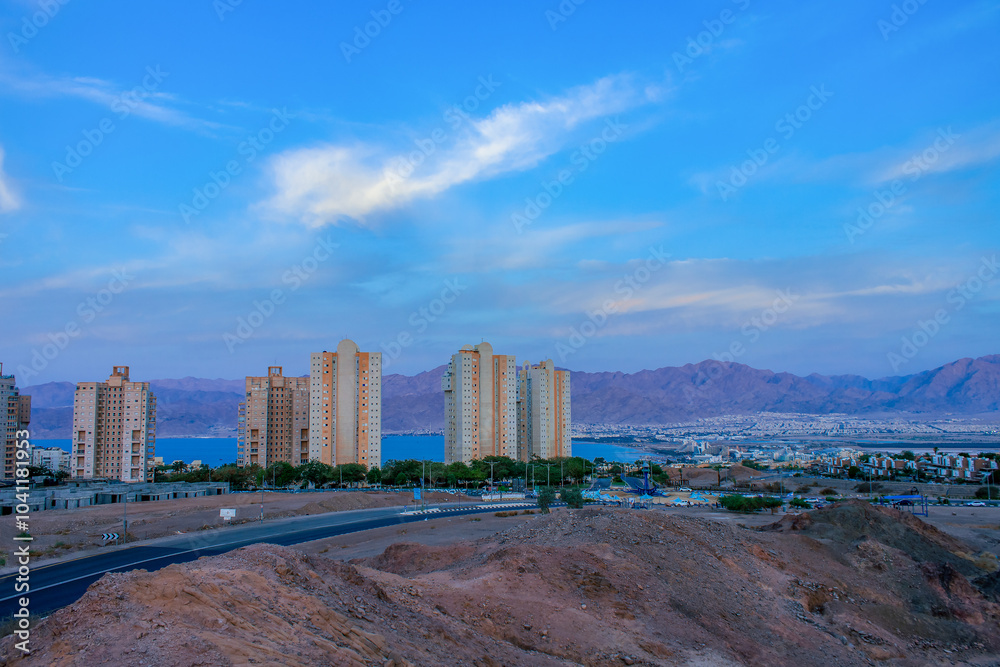 modern city in desert near sea Middle East region twilight low lighting country side landmark landscape environment space modern city in desert near sea Middle East region twilight low lighting country side landmark landscape environment space