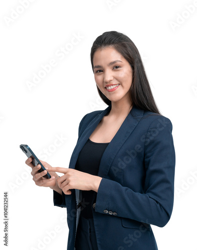 A young businesswoman in formal attire using a smartphone and smiling, isolated on a white background. Concept of communication and technology