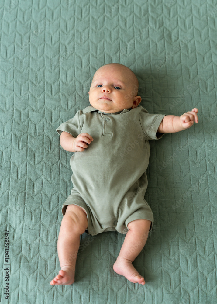 Fototapeta premium Portrait of Infant. Healthy physical and mental development of child. newborn baby in first months of life