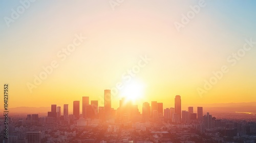 Panoramic cityscape at sunrise with a stunning skyline silhouette against a vibrant sky