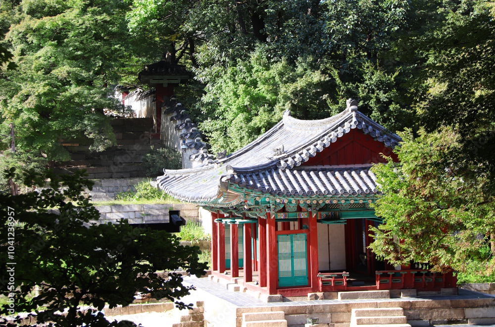 Ancient pavilion in Secret garden Huwon, Changdeokgung Palace complex, Seoul, South Korea. Beautiful landscape with colourful pavilion in Changdeokgung Palace Ancient pavilion in Secret garden Huwon, Changdeokgung Palace complex, Seoul, South Korea. Beautiful landscape with colourful pavilion in Changdeokgung Palace