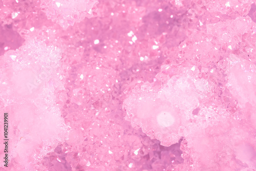 Amethyst pink crystals. Gems. Mineral crystals in the natural environment. Texture of precious and semiprecious stones. Seamless background with copy space colored shiny surface of precious stones. photo