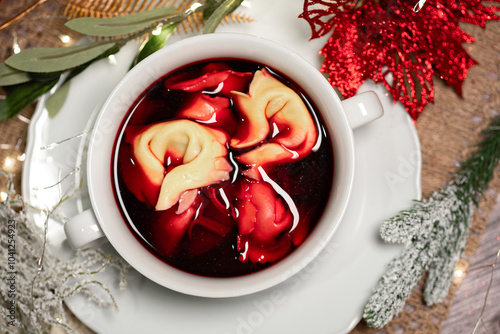 Christmas beetroot soup, traditional Polish Christmas beetroot soup with dumplings photo