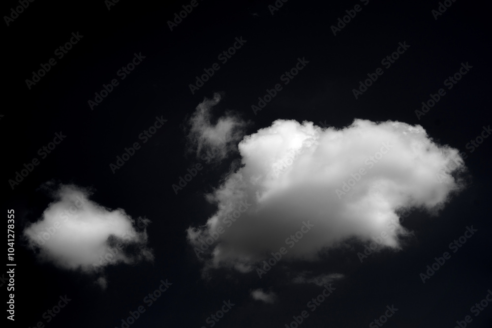 Obraz premium Single white cloud isolated on black background and texture. Brush cloud black background. dark cloud.