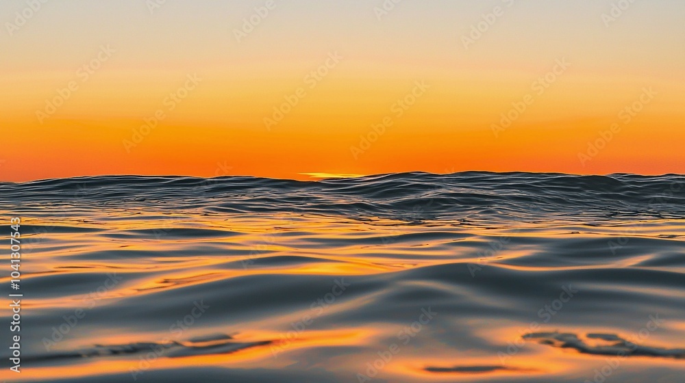 Breathtaking Sunset Over Calm Ocean with Warm Orange Sky Reflection Breathtaking Sunset Over Calm Ocean with Warm Orange Sky Reflection