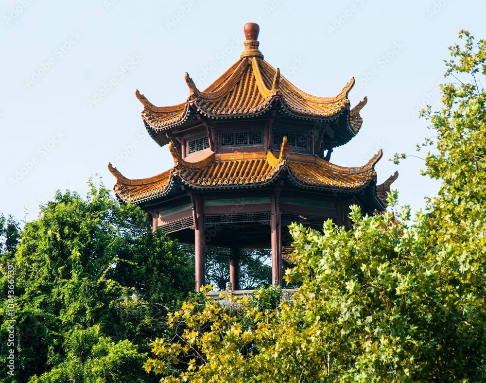Traditional Chinese pavilion amidst greenery Traditional Chinese pavilion amidst greenery