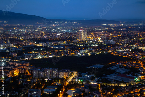 City illuminated at dusk, seen from above. The European capital of North Macedonia, Skopje.