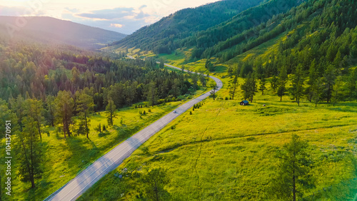 Photos the car is driving along a mountain road in Altai