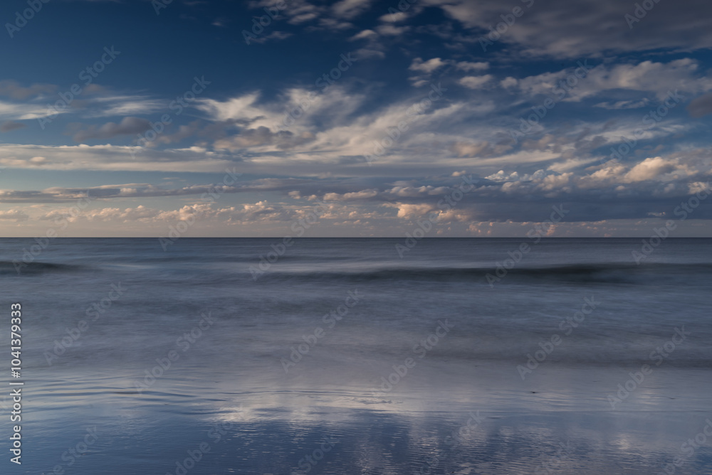 Fototapeta premium SEA COAST - Seascape with picturesque clouds in the sky