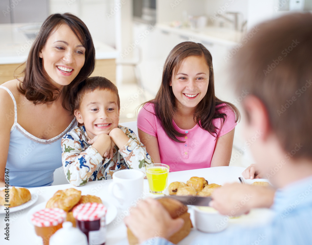 Happy family, morning and breakfast with children at dining table for meal, snack or bread at home. Mother, father and kids or siblings with smile for weekend, holiday or bonding in brunch at house Happy family, morning and breakfast with children at dining table for meal, snack or bread at home. Mother, father and kids or siblings with smile for weekend, holiday or bonding in brunch at house
