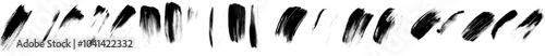 An artistic banner collection of gouache paint daubs on a white background.