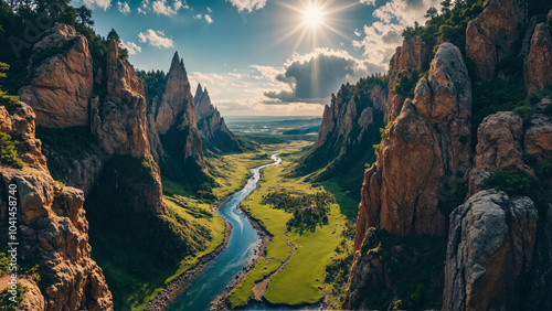 A breathtaking landscape with rugged cliffs, a winding river, lush green valleys, and distant ocean view under a partly cloudy sky.